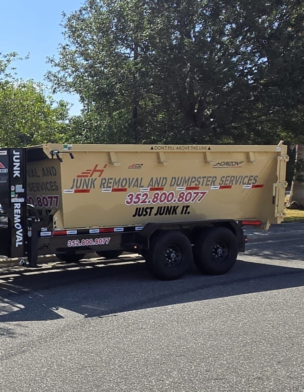 EPM & Services junk removal dumpster trailer parked in Eustis, FL EPM & Services junk removal dumpster trailer parked in Eustis, FL